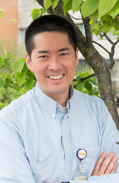 Picture of man with his arms crossed