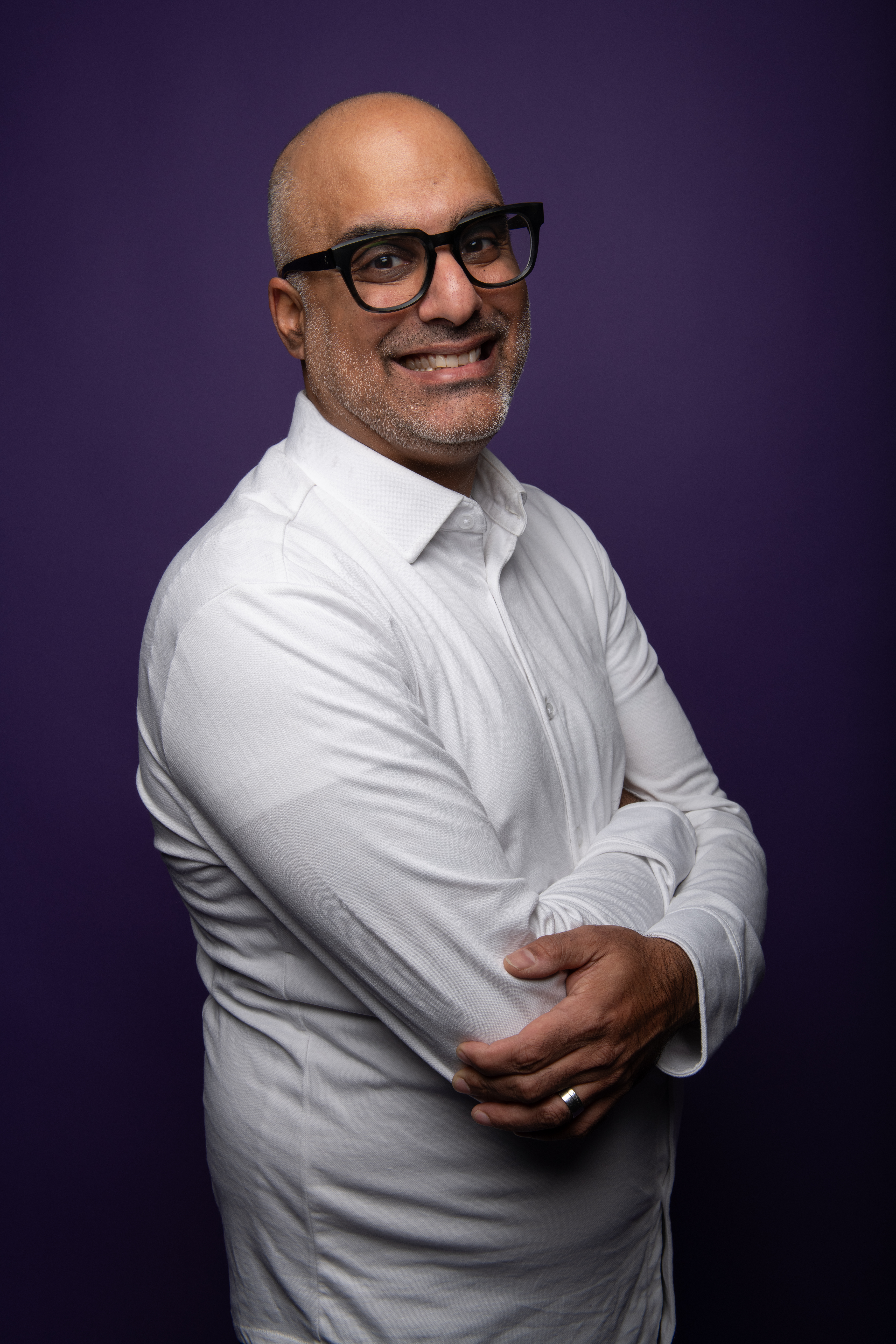 Main with glasses and blazer