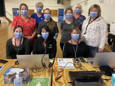 Vaccine-team-with-masks.jpg