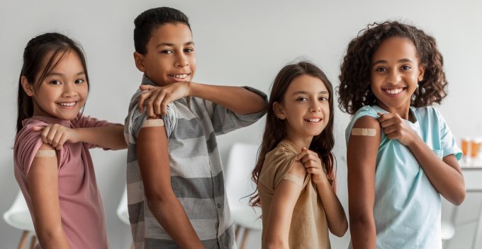revised-cheerful-vaccinated-kids-showing-arms-after-covid-2022-12-16-08-27-32-utc.jpg