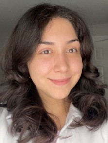 Woman with long dark wavy hair